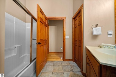 This home reflects a deep appreciation for quality and comfort on Cedar River Golf Course in Michigan - for sale on GolfHomes.com, golf home, golf lot