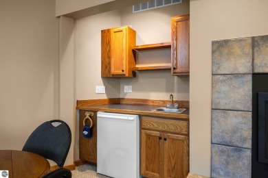 This home reflects a deep appreciation for quality and comfort on Cedar River Golf Course in Michigan - for sale on GolfHomes.com, golf home, golf lot
