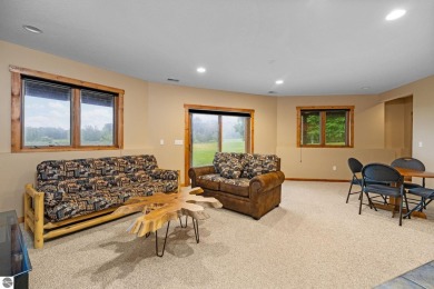 This home reflects a deep appreciation for quality and comfort on Cedar River Golf Course in Michigan - for sale on GolfHomes.com, golf home, golf lot