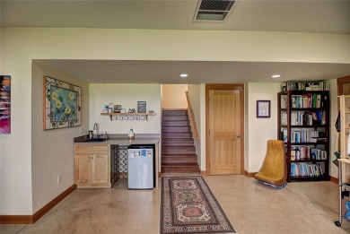 Welcome to this beautiful custom-built home in the Mission Bay on Polson Bay Golf Course - Championship Course in Montana - for sale on GolfHomes.com, golf home, golf lot