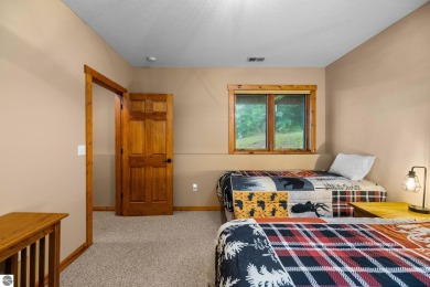 This home reflects a deep appreciation for quality and comfort on Cedar River Golf Course in Michigan - for sale on GolfHomes.com, golf home, golf lot