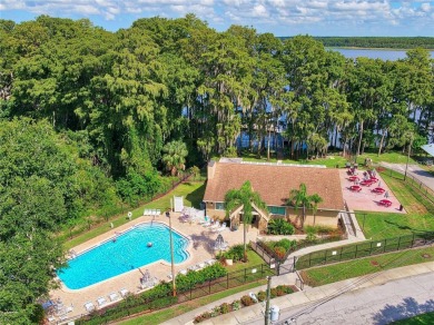 This exceptional villa home features wide golf course views and on Highland Lakes Executive Golf Course in Florida - for sale on GolfHomes.com, golf home, golf lot