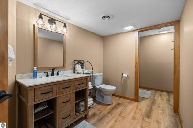 This home reflects a deep appreciation for quality and comfort on Cedar River Golf Course in Michigan - for sale on GolfHomes.com, golf home, golf lot