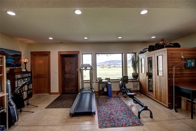 Welcome to this beautiful custom-built home in the Mission Bay on Polson Bay Golf Course - Championship Course in Montana - for sale on GolfHomes.com, golf home, golf lot