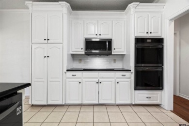 Welcome to 108 Saint Andrews Circle, blending Hideaway's on Hide-A-Way Lake Golf Course in Texas - for sale on GolfHomes.com, golf home, golf lot