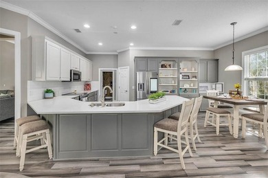 Welcome to this stunning 2,887-square-foot home that perfectly on Oak Grove Island Golf and Country Club in Georgia - for sale on GolfHomes.com, golf home, golf lot