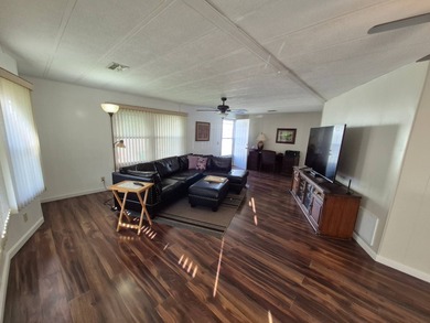 This 1982 2 bed 2 bath is in a 55+ Spanish lakes community. It on Spanish Lakes Country Club in Florida - for sale on GolfHomes.com, golf home, golf lot