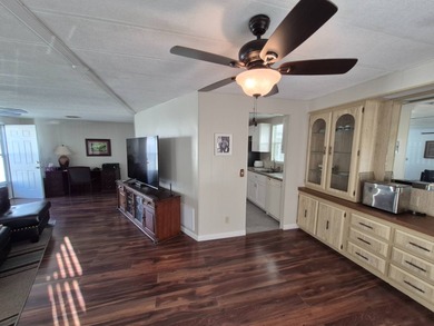 This 1982 2 bed 2 bath is in a 55+ Spanish lakes community. It on Spanish Lakes Country Club in Florida - for sale on GolfHomes.com, golf home, golf lot