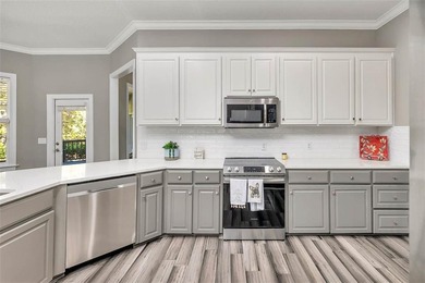 Welcome to this stunning 2,887-square-foot home that perfectly on Oak Grove Island Golf and Country Club in Georgia - for sale on GolfHomes.com, golf home, golf lot