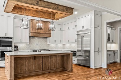 Luxury and comfort in this extraordinary 6 bedroom, 6.5 bath on The Georgia Club in Georgia - for sale on GolfHomes.com, golf home, golf lot