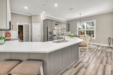 Welcome to this stunning 2,887-square-foot home that perfectly on Oak Grove Island Golf and Country Club in Georgia - for sale on GolfHomes.com, golf home, golf lot