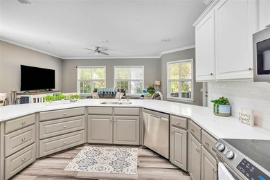 Welcome to this stunning 2,887-square-foot home that perfectly on Oak Grove Island Golf and Country Club in Georgia - for sale on GolfHomes.com, golf home, golf lot