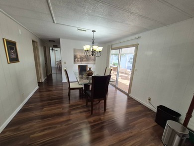 This 1982 2 bed 2 bath is in a 55+ Spanish lakes community. It on Spanish Lakes Country Club in Florida - for sale on GolfHomes.com, golf home, golf lot