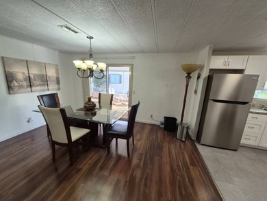 This 1982 2 bed 2 bath is in a 55+ Spanish lakes community. It on Spanish Lakes Country Club in Florida - for sale on GolfHomes.com, golf home, golf lot