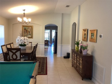 Located at Stonebridge Lakes in MetroWest this brightness on MetroWest Golf Club in Florida - for sale on GolfHomes.com, golf home, golf lot