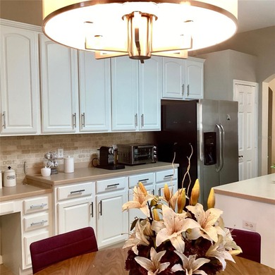 Located at Stonebridge Lakes in MetroWest this brightness on MetroWest Golf Club in Florida - for sale on GolfHomes.com, golf home, golf lot