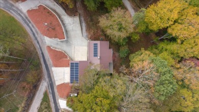 Lakehouse in private resort on Hide-A-Way Hills Golf Club in Ohio - for sale on GolfHomes.com, golf home, golf lot