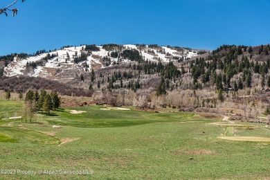 Just a few minutes west of town, sits this peaceful top floor on Maroon Creek Club in Colorado - for sale on GolfHomes.com, golf home, golf lot