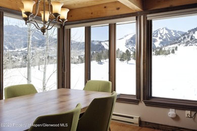 Just a few minutes west of town, sits this peaceful top floor on Maroon Creek Club in Colorado - for sale on GolfHomes.com, golf home, golf lot