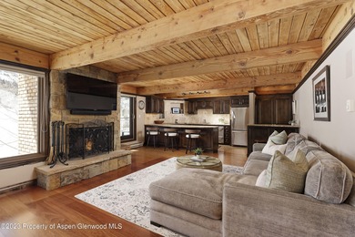 Just a few minutes west of town, sits this peaceful top floor on Maroon Creek Club in Colorado - for sale on GolfHomes.com, golf home, golf lot