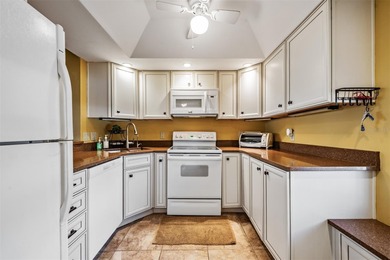 This immaculate, beautifully updated two-bedroom, two-bath on Cove Cay Country Club in Florida - for sale on GolfHomes.com, golf home, golf lot