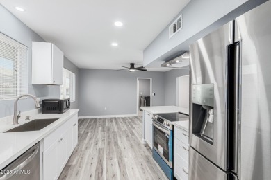 A gorgeous remodeled 3 bed, 2 bath townhouse on a golf course in on Sun City Country Club in Arizona - for sale on GolfHomes.com, golf home, golf lot
