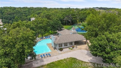 Welcome to your lakefront retreat in the most sought after on Seasons Ridge At Four Seasons in Missouri - for sale on GolfHomes.com, golf home, golf lot