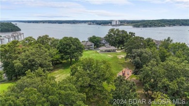 Welcome to your lakefront retreat in the most sought after on Seasons Ridge At Four Seasons in Missouri - for sale on GolfHomes.com, golf home, golf lot