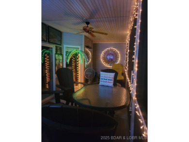 Welcome to your lakefront retreat in the most sought after on Seasons Ridge At Four Seasons in Missouri - for sale on GolfHomes.com, golf home, golf lot