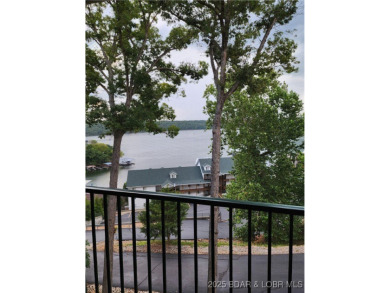 This condo is like living in a treehouse! Very private deck with on Bear Creek Valley Golf Club in Missouri - for sale on GolfHomes.com, golf home, golf lot