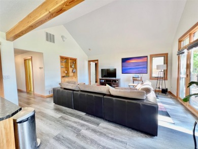 Welcome to low-maintenance luxury living in the heart of Mission on Polson Bay Golf Course - Championship Course in Montana - for sale on GolfHomes.com, golf home, golf lot