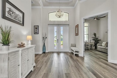 Discover the epitome of luxurious, low maintenance living in on River Hall Country Club in Florida - for sale on GolfHomes.com, golf home, golf lot