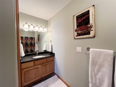 Welcome to low-maintenance luxury living in the heart of Mission on Polson Bay Golf Course - Championship Course in Montana - for sale on GolfHomes.com, golf home, golf lot