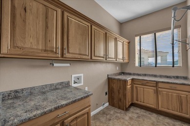 Nestled within a desirable gated community in Green Springs on Green Spring Country Club in Utah - for sale on GolfHomes.com, golf home, golf lot