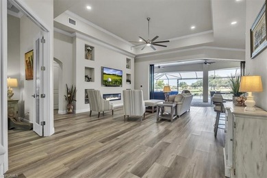 Discover the epitome of luxurious, low maintenance living in on River Hall Country Club in Florida - for sale on GolfHomes.com, golf home, golf lot