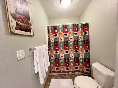 Welcome to low-maintenance luxury living in the heart of Mission on Polson Bay Golf Course - Championship Course in Montana - for sale on GolfHomes.com, golf home, golf lot