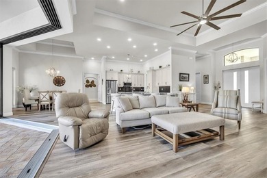 Discover the epitome of luxurious, low maintenance living in on River Hall Country Club in Florida - for sale on GolfHomes.com, golf home, golf lot