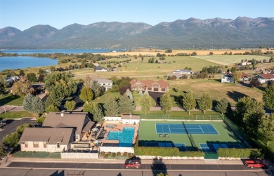 Welcome to low-maintenance luxury living in the heart of Mission on Polson Bay Golf Course - Championship Course in Montana - for sale on GolfHomes.com, golf home, golf lot