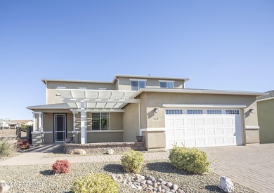 Immaculate 2386 sf home BACKING 15th Green of Quailwood Golf on Quail Wood Greens Golf Course in Arizona - for sale on GolfHomes.com, golf home, golf lot