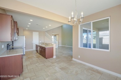 Immaculate 2386 sf home BACKING 15th Green of Quailwood Golf on Quail Wood Greens Golf Course in Arizona - for sale on GolfHomes.com, golf home, golf lot