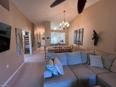 GOLF INCLUDED with this bright end unit condo in Cypress Woods on Cypress Woods Golf and Country Club in Florida - for sale on GolfHomes.com, golf home, golf lot