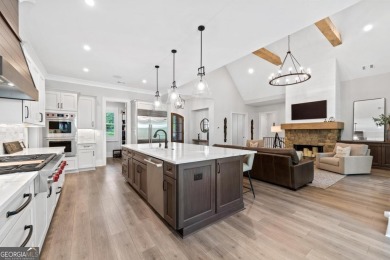 Live the lake life you've always dreamed of in this stunning on Reynolds Lake Oconee - The Oconee in Georgia - for sale on GolfHomes.com, golf home, golf lot