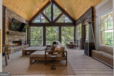 Live the lake life you've always dreamed of in this stunning on Reynolds Lake Oconee - The Oconee in Georgia - for sale on GolfHomes.com, golf home, golf lot