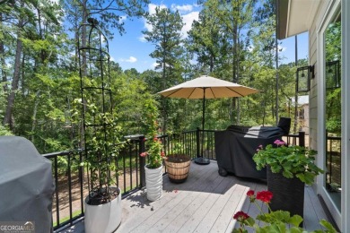 Live the lake life you've always dreamed of in this stunning on Reynolds Lake Oconee - The Oconee in Georgia - for sale on GolfHomes.com, golf home, golf lot
