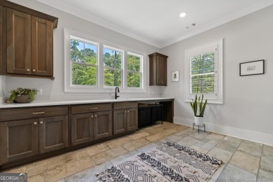 Live the lake life you've always dreamed of in this stunning on Reynolds Lake Oconee - The Oconee in Georgia - for sale on GolfHomes.com, golf home, golf lot
