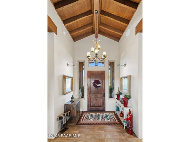 Views, golf, and luxury. Framed by iconic Granite Mountain views on Talking Rock Golf Club in Arizona - for sale on GolfHomes.com, golf home, golf lot