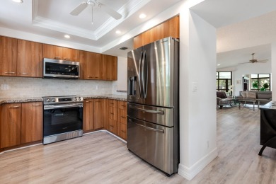 Discover modern living at its finest in this beautifully on Gleneagles Golf and Country Club in Florida - for sale on GolfHomes.com, golf home, golf lot