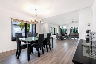 Discover modern living at its finest in this beautifully on Gleneagles Golf and Country Club in Florida - for sale on GolfHomes.com, golf home, golf lot