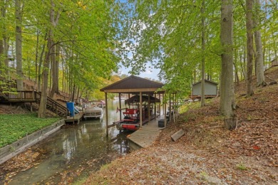 Lakehouse in private resort on Hide-A-Way Hills Golf Club in Ohio - for sale on GolfHomes.com, golf home, golf lot