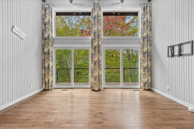 Lakehouse in private resort on Hide-A-Way Hills Golf Club in Ohio - for sale on GolfHomes.com, golf home, golf lot